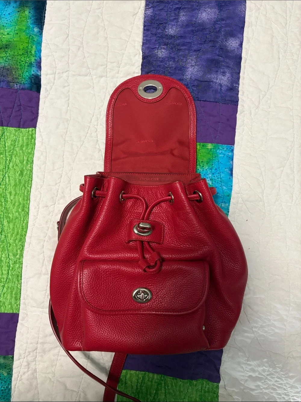 Coach compact pebbled